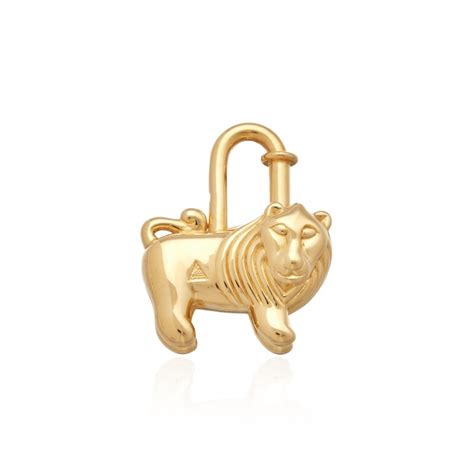 hermes lion afrika charm|Hermès Vintage Gold Plated Africa Lion Cadena Lock Charm, .